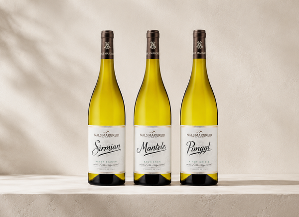 Dalla montagna dell’Alto Adige alla tavola: l’estate di Nals Margreid attraverso tre vini iconici.